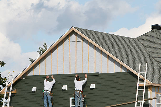 Professional Siding technician working in Spring Church, PA